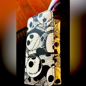 Selling a brand new Disney Nightmare Before Christmas wallet going for 10 bucks